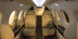 Embraer Phenom 300 cabin for Naples charter
