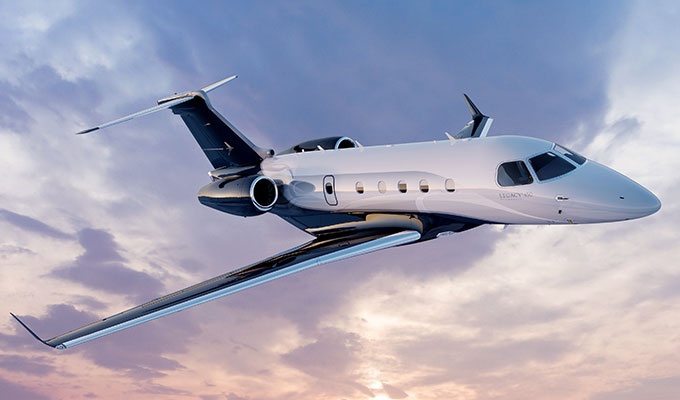 Embraer Legacy 450 midsize jet for Naples charter