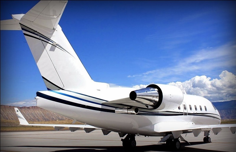 Challenger jet on the ramp for wheelchair-accessible charter from Naples, Florida