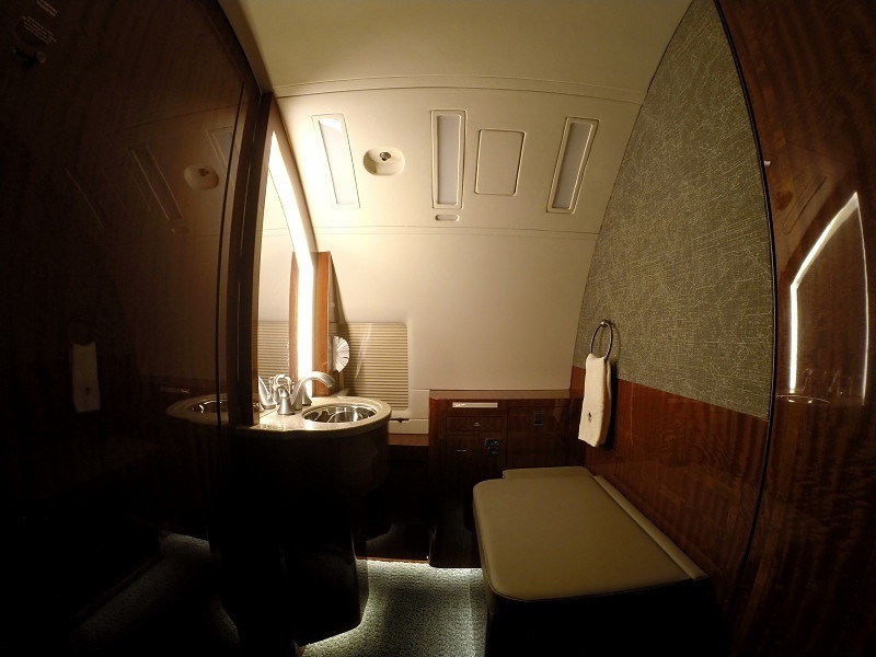 Private jet lavatory and vanity on an accessible charter aircraft from Naples, Florida